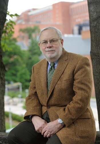 Dr. Alan Schechter - Dr. Alan N. Schechter seated outdoors