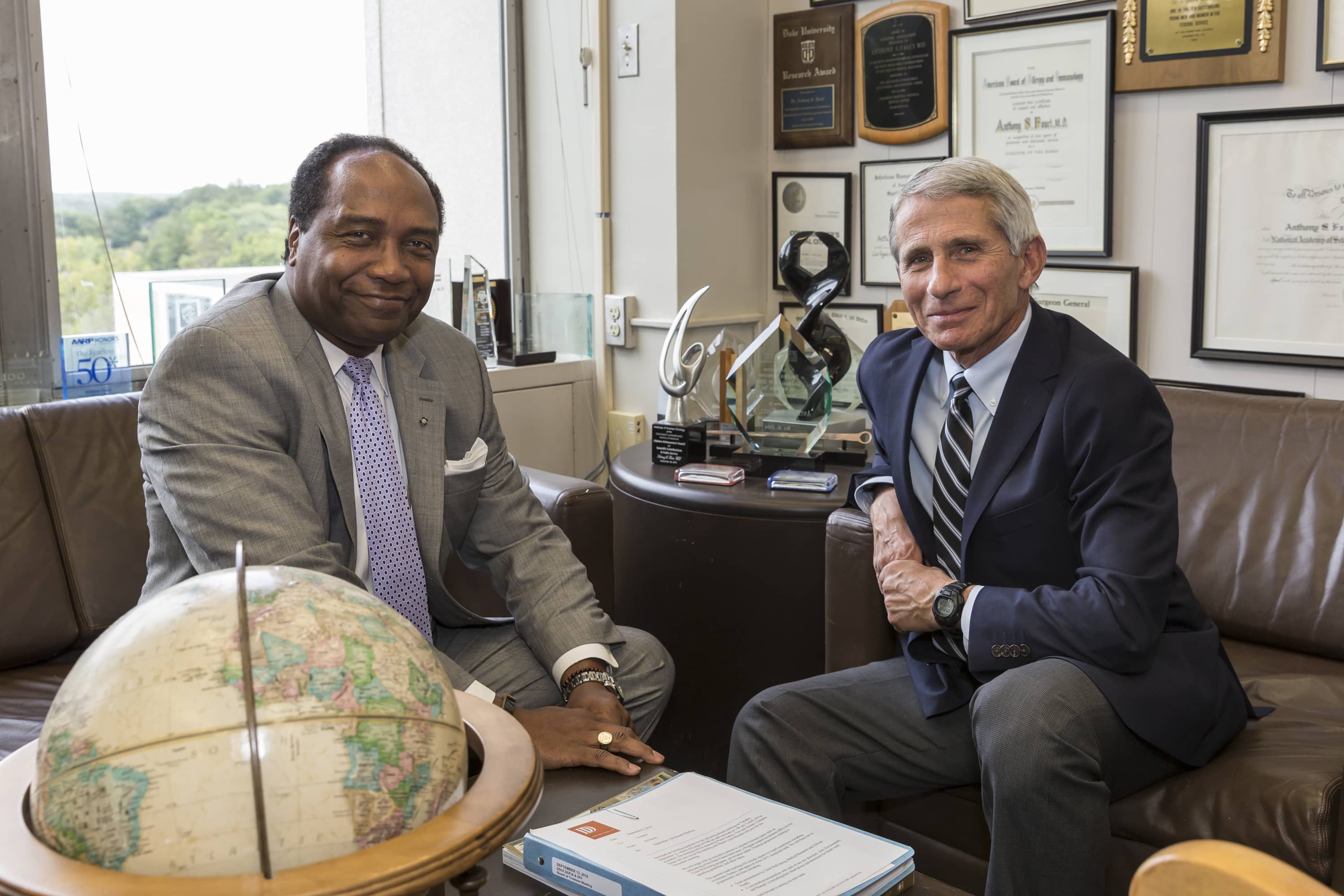 Drs. Rodgers and Fauci sitting in an office.