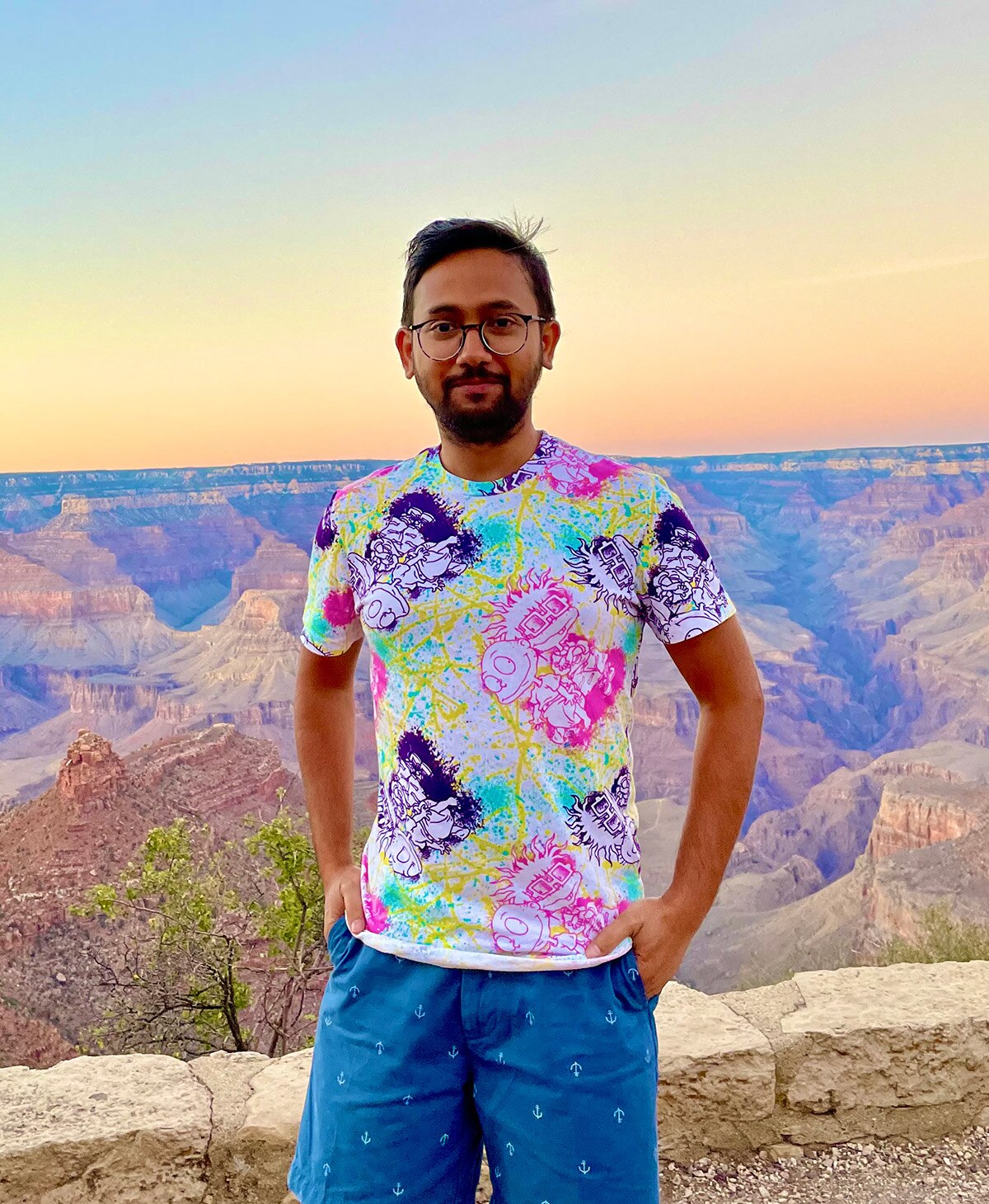 Dr. Shubhra Saha poses at the Grand Canyon at sunset
