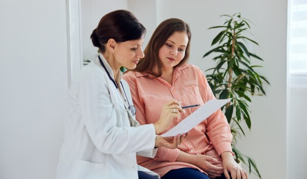 A doctor and a patient talking.