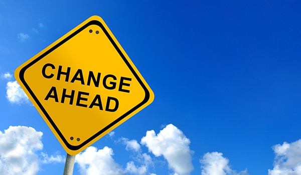 Change Ahead yield sign with blue sky background