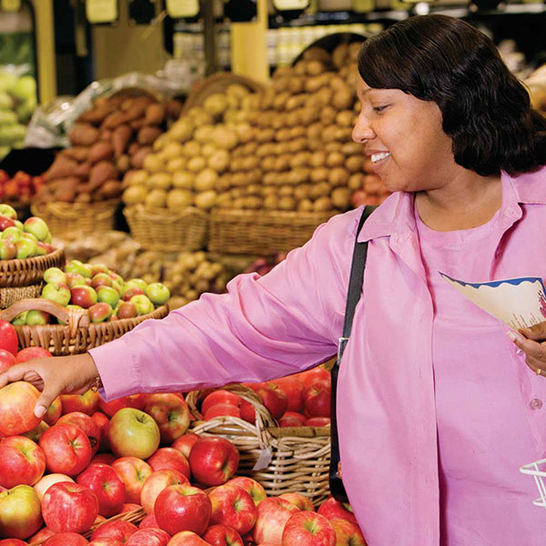 Woman shopping for produce