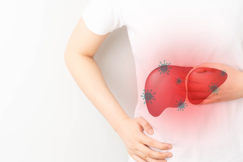 A liver infected with viruses on a human torso.