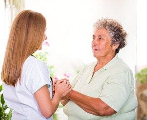 Health care professional talking with a patient