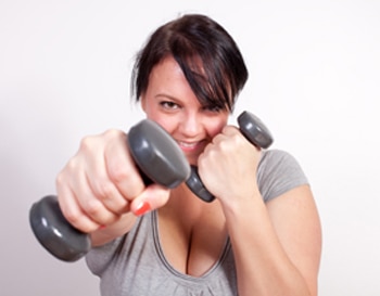 A woman using hand weights