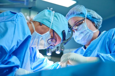 Surgeons performing an operation.