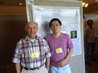 Photo of Pang and Paul showing their poster presented at 2013 Gordon Conference on Carbohydrates